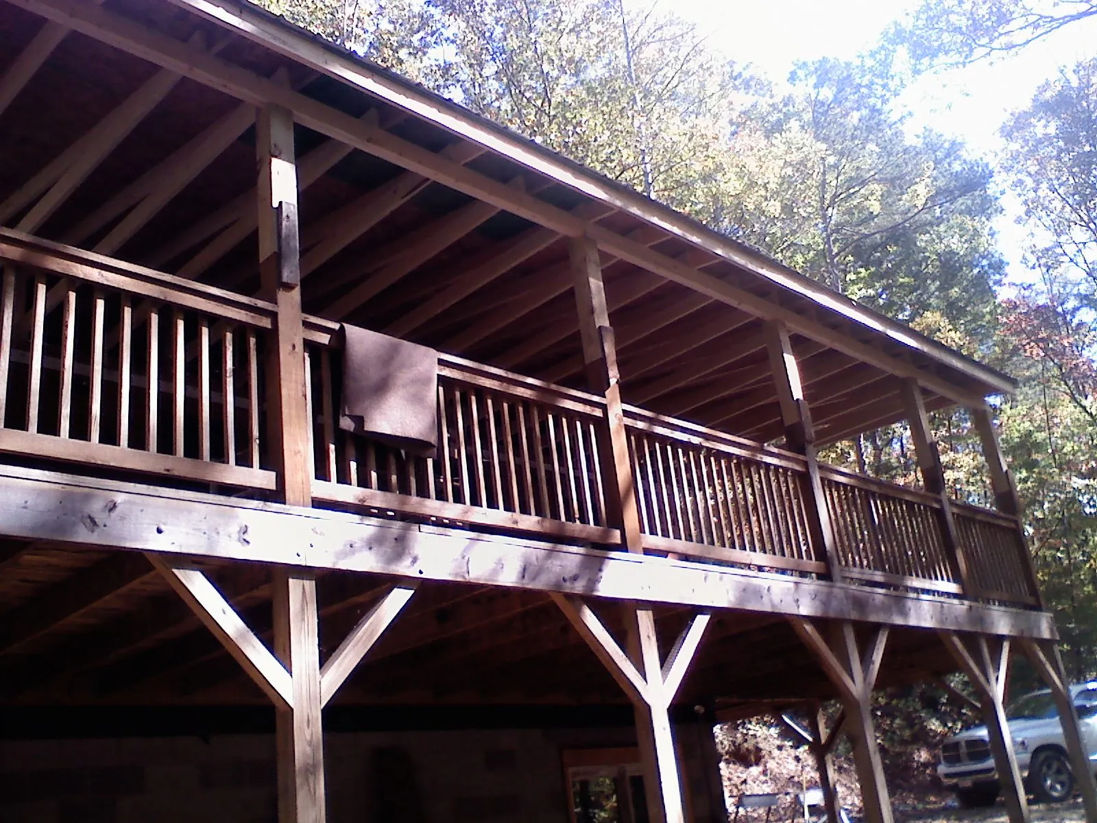 Timber framing under a new elevated porch and deck — Roof Leak Repair in Monument Beach by Roofing Brothers